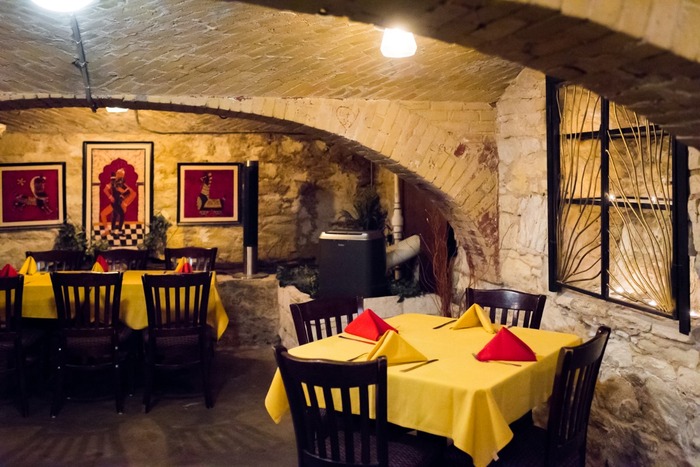 Inside view of the downstairs dining room at The Clay Pit restaurant in Austin, Texas